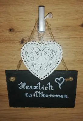Ein Zertifikat, Auszeichnung, Logo oder anderes Dokument, das in der Unterkunft Dreilärchenhaus ausgestellt ist
