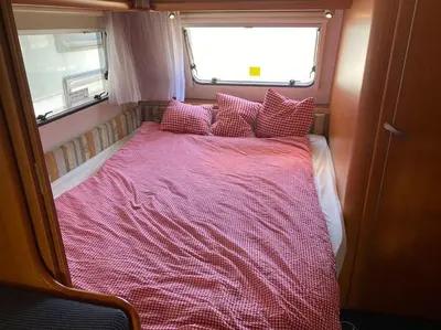 Ein Bett oder Betten in einem Zimmer der Unterkunft ***** Camping Aufenfeld - Sonnenglückhütte