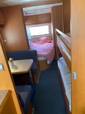 Ein Bett oder Betten in einem Zimmer der Unterkunft ***** Camping Aufenfeld - Sonnenglückhütte