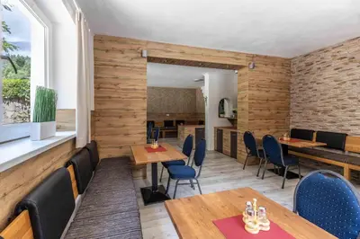 Ein Sitzbereich in der Unterkunft Hartkaiser Rooms and Apartments