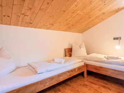 Ein Bett oder Betten in einem Zimmer der Unterkunft Obinghof