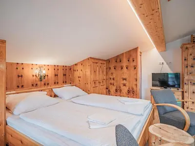 Ein Bett oder Betten in einem Zimmer der Unterkunft Röck III IV