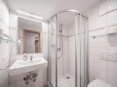 Ein Badezimmer in der Unterkunft Röck IV