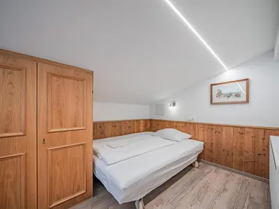 Ein Bett oder Betten in einem Zimmer der Unterkunft Röck IV