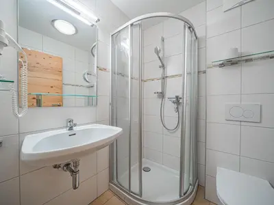 Ein Badezimmer in der Unterkunft Röck IA