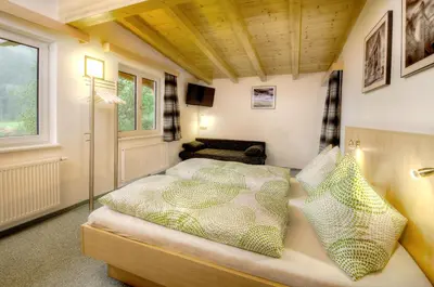 Ein Bett oder Betten in einem Zimmer der Unterkunft Haus Brandner