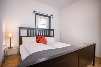 Ein Bett oder Betten in einem Zimmer der Unterkunft Chalet Rosenweg