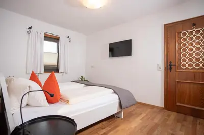 Ein Bett oder Betten in einem Zimmer der Unterkunft Chalet Rosenweg