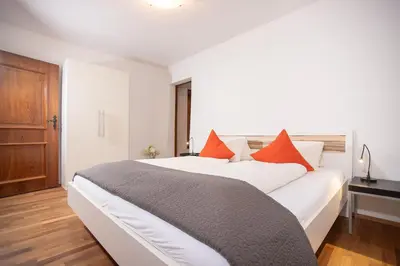 Ein Bett oder Betten in einem Zimmer der Unterkunft Chalet Rosenweg