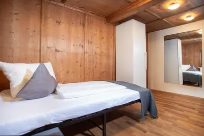 Ein Bett oder Betten in einem Zimmer der Unterkunft Chalet Rosenweg