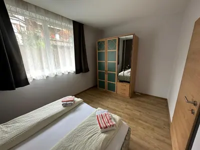 Ein Bett oder Betten in einem Zimmer der Unterkunft Top 1 Gartenwohnung