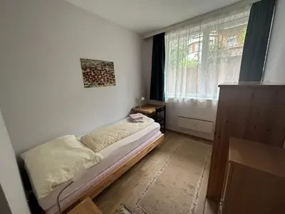 Ein Bett oder Betten in einem Zimmer der Unterkunft Top 1 Gartenwohnung