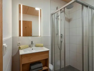 Ein Badezimmer in der Unterkunft M&M Appartements Brixental