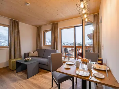 Ein Sitzbereich in der Unterkunft M&M Appartements Brixental