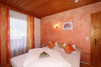 Ein Bett oder Betten in einem Zimmer der Unterkunft Landhaus Granat