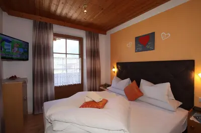 Ein Bett oder Betten in einem Zimmer der Unterkunft Landhaus Granat