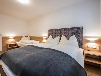 Ein Bett oder Betten in einem Zimmer der Unterkunft Apartment Montec-3 by Interhome