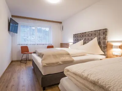 Ein Bett oder Betten in einem Zimmer der Unterkunft Apartment Montec Apart 2 by Interhome