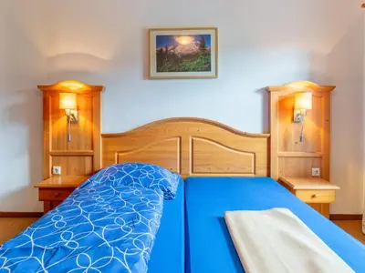 Ein Bett oder Betten in einem Zimmer der Unterkunft Pension Blaiken XL