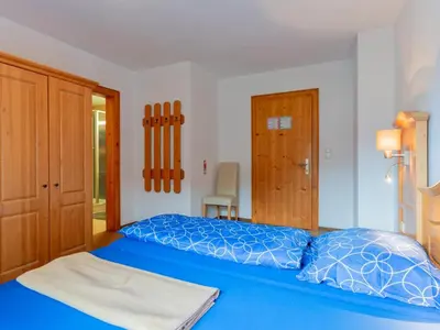 Ein Bett oder Betten in einem Zimmer der Unterkunft Pension Blaiken XL