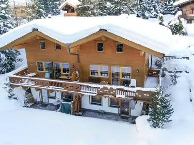 Chalet Hochkrimml with sauna on the ski slope im Winter
