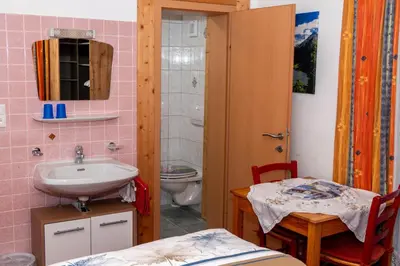 Ein Badezimmer in der Unterkunft Haus Alpenfrieden