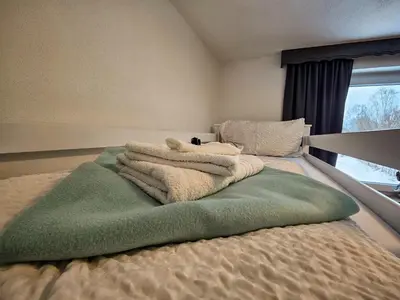 Ein Bett oder Betten in einem Zimmer der Unterkunft Gruppenhaus Alpenglück
