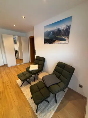 Ein Sitzbereich in der Unterkunft Ferienwohnung Rofanblick