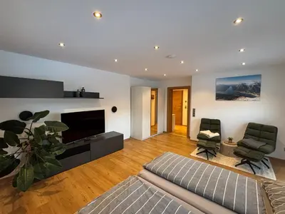 Ein Sitzbereich in der Unterkunft Ferienwohnung Rofanblick