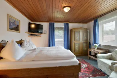 Ein Bett oder Betten in einem Zimmer der Unterkunft Ferienhaus Chalet Aumayr