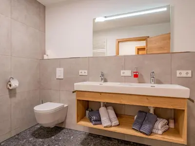 Ein Badezimmer in der Unterkunft Hoferlitzlhubgut