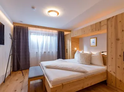 Ein Bett oder Betten in einem Zimmer der Unterkunft Appartementhaus Bambi