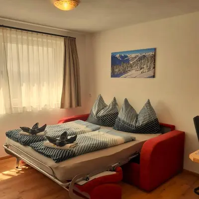 Ein Bett oder Betten in einem Zimmer der Unterkunft Haus Sandra