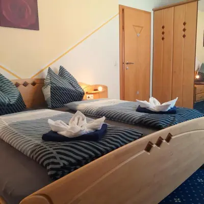 Ein Bett oder Betten in einem Zimmer der Unterkunft Haus Sandra