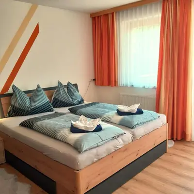 Ein Bett oder Betten in einem Zimmer der Unterkunft Haus Sandra