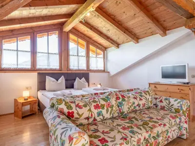 Ein Bett oder Betten in einem Zimmer der Unterkunft Appartement Brixnerwirt IV