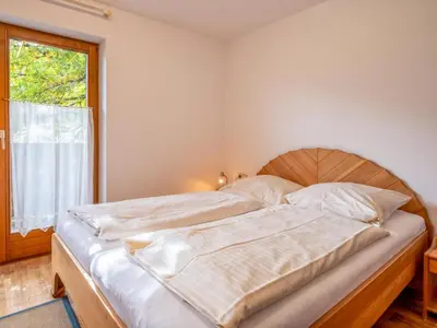 Ein Bett oder Betten in einem Zimmer der Unterkunft Appartement Brixnerwirt I