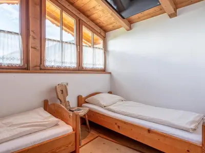 Ein Bett oder Betten in einem Zimmer der Unterkunft Appartementkombination Brixnerwirt I II III und IV