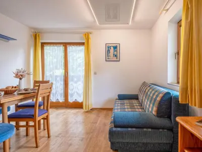 Ein Sitzbereich in der Unterkunft Appartementkombination Brixnerwirt I und II