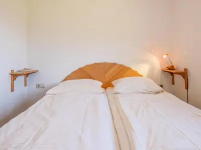 Ein Bett oder Betten in einem Zimmer der Unterkunft Appartementkombination Brixnerwirt I und II