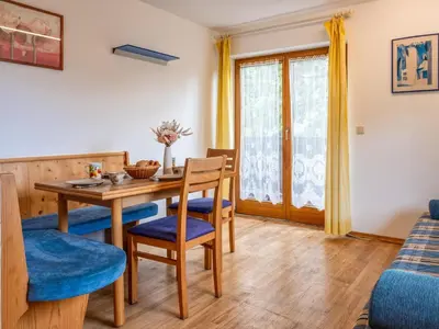Ein Sitzbereich in der Unterkunft Appartementkombination Brixnerwirt I und II