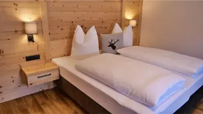 Ein Bett oder Betten in einem Zimmer der Unterkunft Bucherwirt Appartements