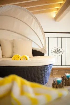 Ein Bett oder Betten in einem Zimmer der Unterkunft Seehotel Brunner
