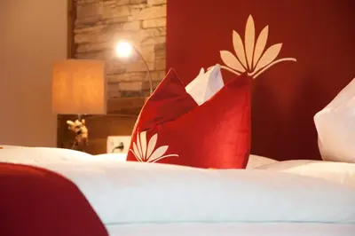 Ein Bett oder Betten in einem Zimmer der Unterkunft Seehotel Brunner