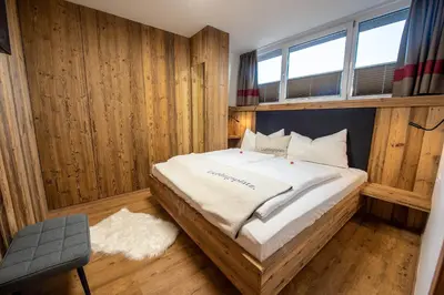 Ein Bett oder Betten in einem Zimmer der Unterkunft Ferienwohnung 73 - Rosenquarz