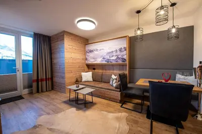 Ein Sitzbereich in der Unterkunft Ferienwohnung 73 - Rosenquarz