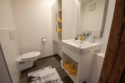 Ein Badezimmer in der Unterkunft Ferienwohnung 73 - Rosenquarz