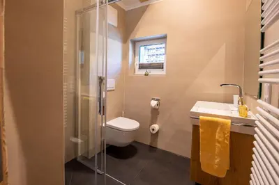 Ein Badezimmer in der Unterkunft Ferienwohnung 73 - Top Bergkristall