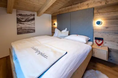 Ein Bett oder Betten in einem Zimmer der Unterkunft Ferienwohnung 73 - Smaragd
