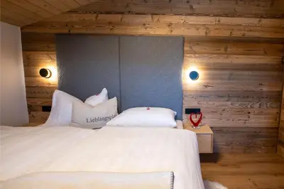 Ein Bett oder Betten in einem Zimmer der Unterkunft Ferienwohnung 73 - Smaragd